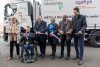 Photo de l'inauguration du Handi Truck. Le ruban est coupé par (de gauche à droite) : Générale Florence Guillaume (déléguée interministérielle à la sécurité routière), Jérémy Soots (conducteur poinds lourd), Christophe Roth (Président de l'Agefiph), Sophie Cluzel (ancienne Secrétaire d'état chargée des personnes en situation de handicap), Denis Schirm, Vice-Président de l'Opco Mobilités et Loïc Charbonnier (Président Aftral).